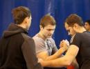 Become an arm wrestling guru.  Sport!  It's not just goals, meters, seconds